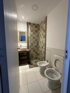 Koupelna v ubytování La Félicité Hostel