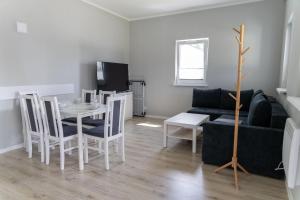 Televiisor ja/või meelelahutuskeskus majutusasutuses Ośrodek Dydaktyczno-Socjalny AWF Poznań +4 fotot