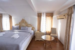 Voodi või voodid majutusasutuse Garni Hotel Palma toas