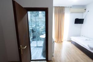 Voodi või voodid majutusasutuse Garni Hotel Palma toas