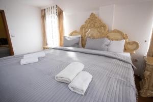 Voodi või voodid majutusasutuse Garni Hotel Palma toas