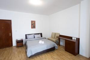 Voodi või voodid majutusasutuse Garni Hotel Palma toas