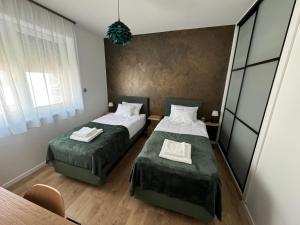 Postel nebo postele na pokoji v ubytování Willow Nest + 27 fotografií
