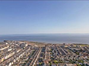 an aerial view of a city and the ocean at Starfish in Porthcawl