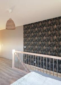 En eller flere senge i et værelse på Duplex neuf avec extérieur