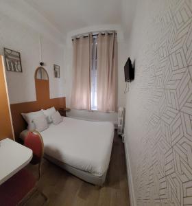 Postel nebo postele na pokoji v ubytování Hotel Central Anzac