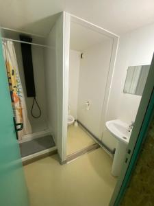 a bathroom with a toilet and a sink at les moulins - studio 6 in Cherbourg en Cotentin