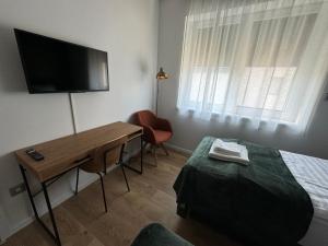 TV a/nebo společenská místnost v ubytování Willow Nest