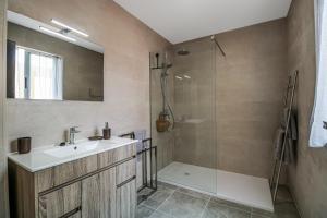 a bathroom with a sink and a shower at Urban Rooms San Roque with Solarium in Las Palmas de Gran Canaria +15 photos