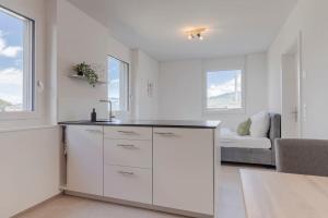 Fotografie z fotogalerie ubytování Blüemlisalp Studio - Aare Jungfrau AG v destinaci Spiez