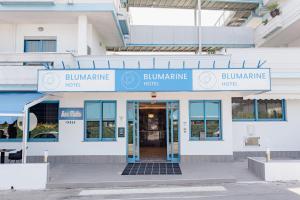 a building with the entrance to the buildings entrance at Hotel BluMarine in Roseto degli Abruzzi