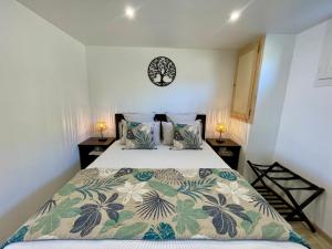 Giường trong phòng chung tại Gîte l’Inattendu