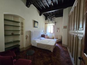 Postel nebo postele na pokoji v ubytování Finestra Dell'Angelo