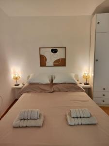 Postel nebo postele na pokoji v ubytování Assi Room