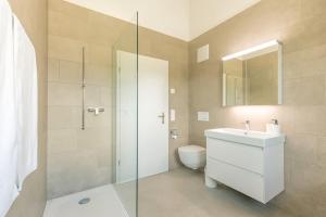 Koupelna v ubytování Niesen Apartment - Aare Jungfrau AG + 25 fotografií