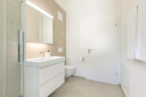 Koupelna v ubytování Niesen Apartment - Aare Jungfrau AG
