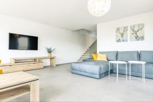 Posezení v ubytování Niesen Apartment - Aare Jungfrau AG