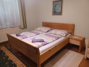 Posteľ alebo postele v izbe v ubytovaní Ferienhaus Renate