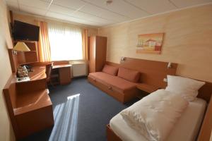 Postel nebo postele na pokoji v ubytování Hotel Nord