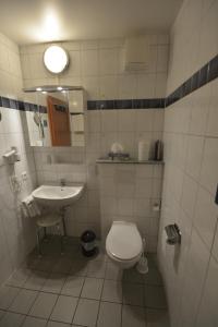 Koupelna v ubytování Hotel Nord