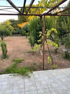 A garden outside Cosy spot near the beach only 45 min from Athens