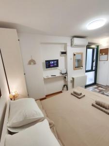 Voodi või voodid majutusasutuse Assi Room toas