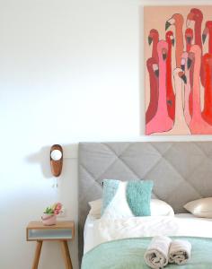 Ein Bett oder Betten in einem Zimmer der Unterkunft Traunseeresidenzen