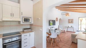 Kuchyň nebo kuchyňský kout v ubytování Casa El Laurel Competa by Ruralidays