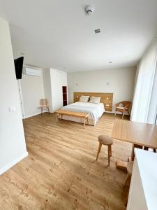 Postel nebo postele na pokoji v ubytování Refúgio Verde Douro