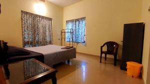Postel nebo postele na pokoji v ubytování Happy Buddha Homestay