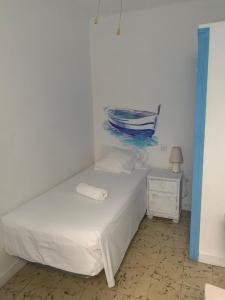 Postel nebo postele na pokoji v ubytování Hotel Bergantí