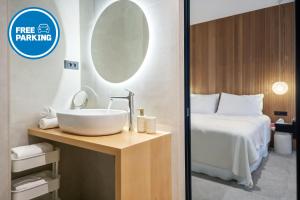 Postel nebo postele na pokoji v ubytování Bugabu Ljubljana