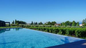 Swimmingpoolen hos eller tæt på CALA Appartamenti