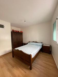 Postel nebo postele na pokoji v ubytování New Alhoceima Appartement APPELLE-MOI 07 et 74 et 41 et 16 et 91