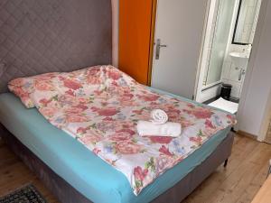 Voodi või voodid majutusasutuse Guesthouse Stremljan Ljubljana toas