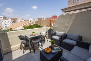 Posedenie v ubytovaní FLORIT FLATS - Stylish 2 Bedroom AC Wifi Terrace Attic in Valencia Center