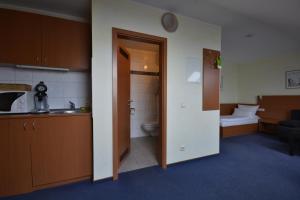 Postel nebo postele na pokoji v ubytování Hotel Nord