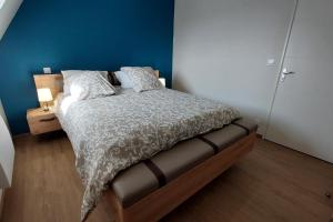 Katil atau katil-katil dalam bilik di Gite pour 6 personnes à 15 min dAurillac Cantal