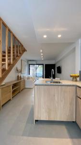 Kuchyň nebo kuchyňský kout v ubytování Duplex en el Cerro de Las Rosas by Lugar