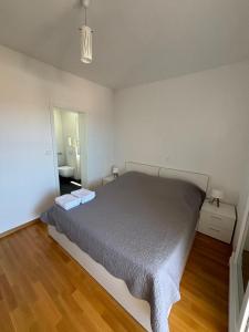 Postel nebo postele na pokoji v ubytování Sea View Apartments Zaboric