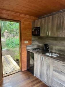 Kuchyň nebo kuchyňský kout v ubytování Houseboat U Vodníka