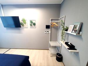 TV a/nebo společenská místnost v ubytování 라비앙즈-Raviens-Elliy's Room