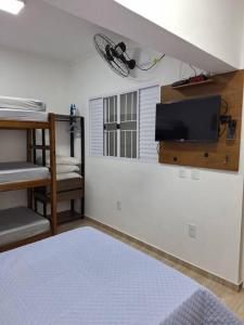 Ένα ή περισσότερα κρεβάτια σε δωμάτιο στο Casa para 5 pessoas próximo ao centro de SN - Casa Nova
