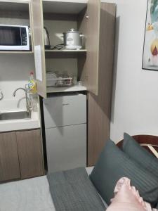 Kuchyň nebo kuchyňský kout v ubytování Nice condotel
