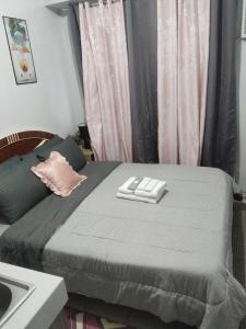 Postel nebo postele na pokoji v ubytování Nice condotel
