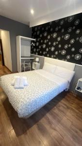 Hostal New Dream Madrid客房内的一张或多张床位