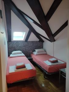 Postel nebo postele na pokoji v ubytování Apartman Sunrise