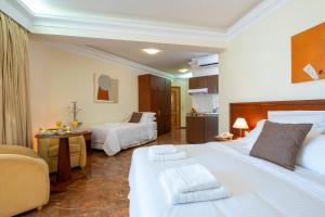 Postel nebo postele na pokoji v ubytování Porto Alegre Hotel