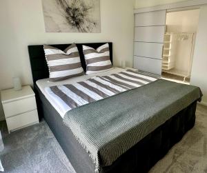 Ένα ή περισσότερα κρεβάτια σε δωμάτιο στο Exklusive Neubau-Ferienwohnung in Warburg