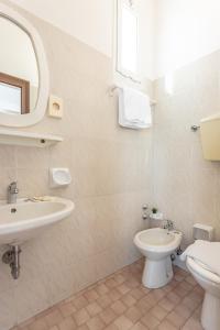 Koupelna v ubytování Hotel Katina